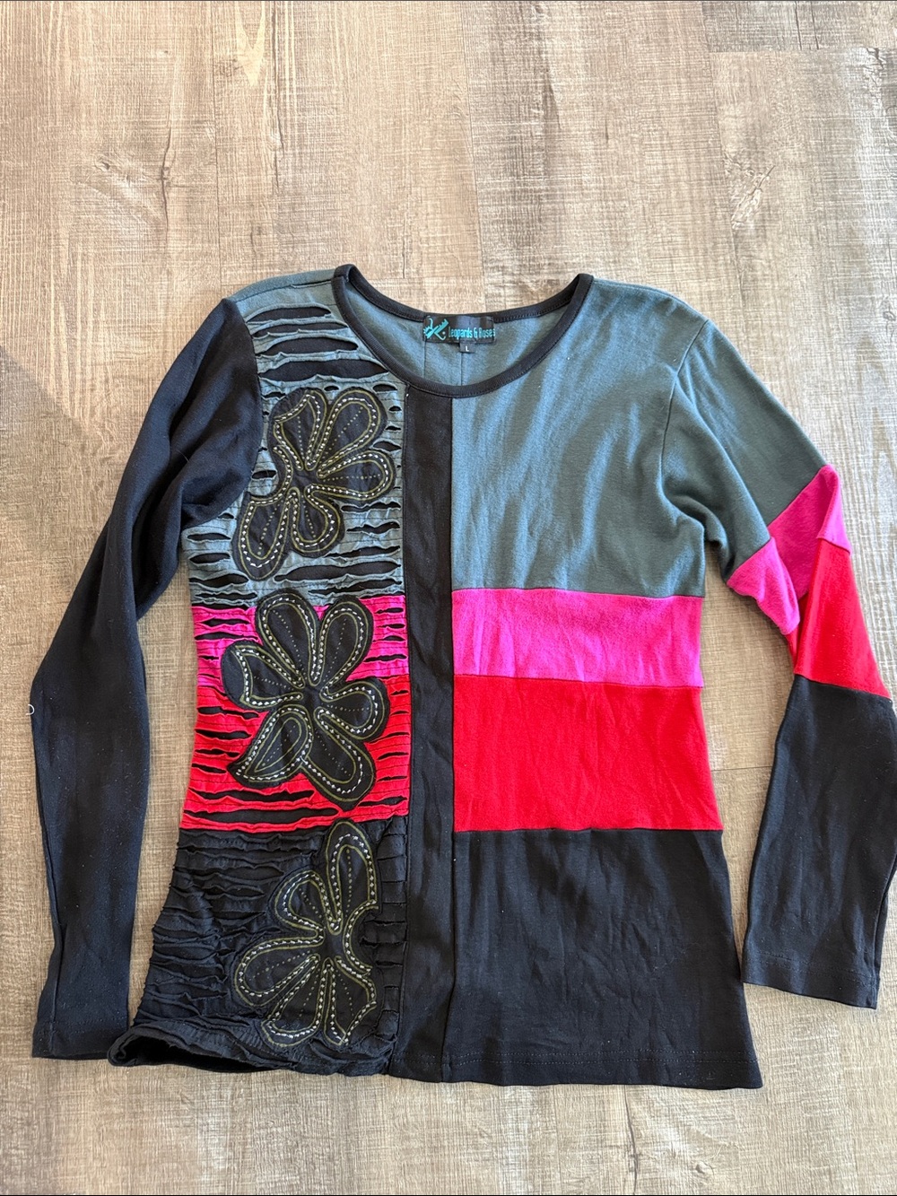 Leopards and Roses L colorblock long sleeve top.